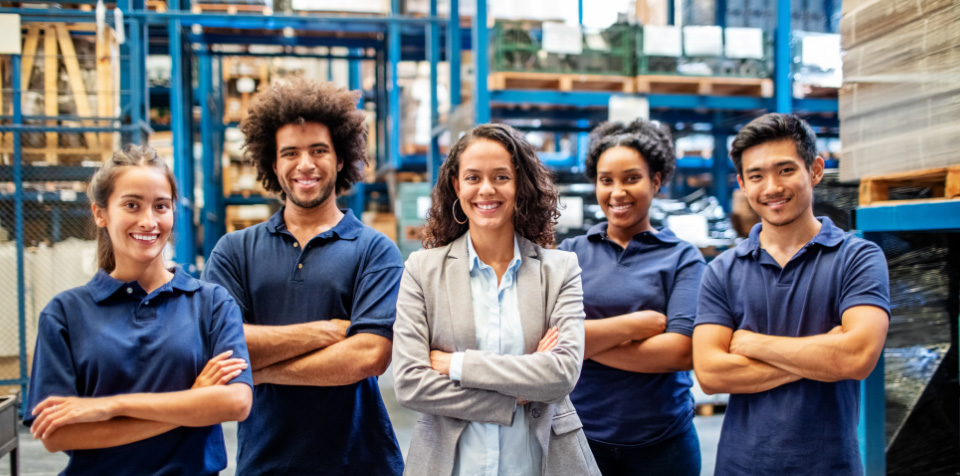 Group of people in a warehouse setting